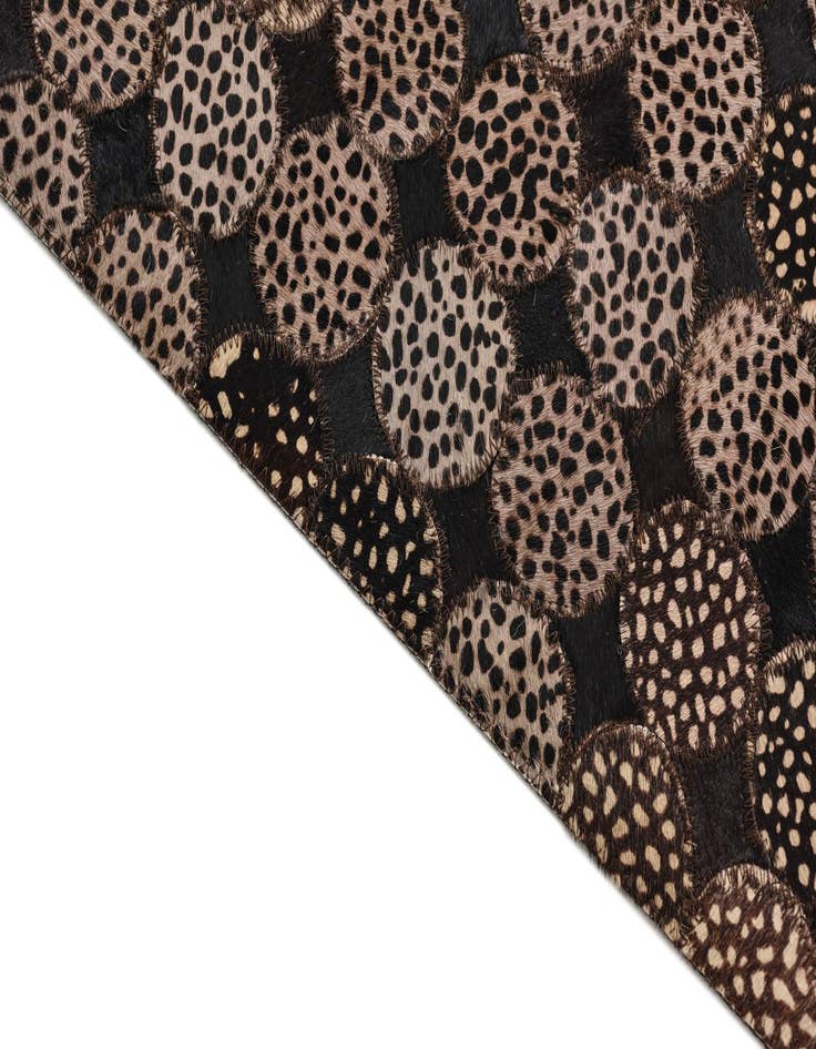 Detail image of  5' 1 x 7' 2 Cowhide Rug