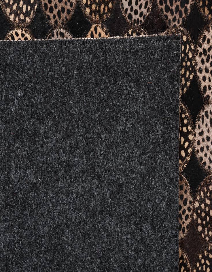 Detail image of  5' 1 x 7' 2 Cowhide Rug