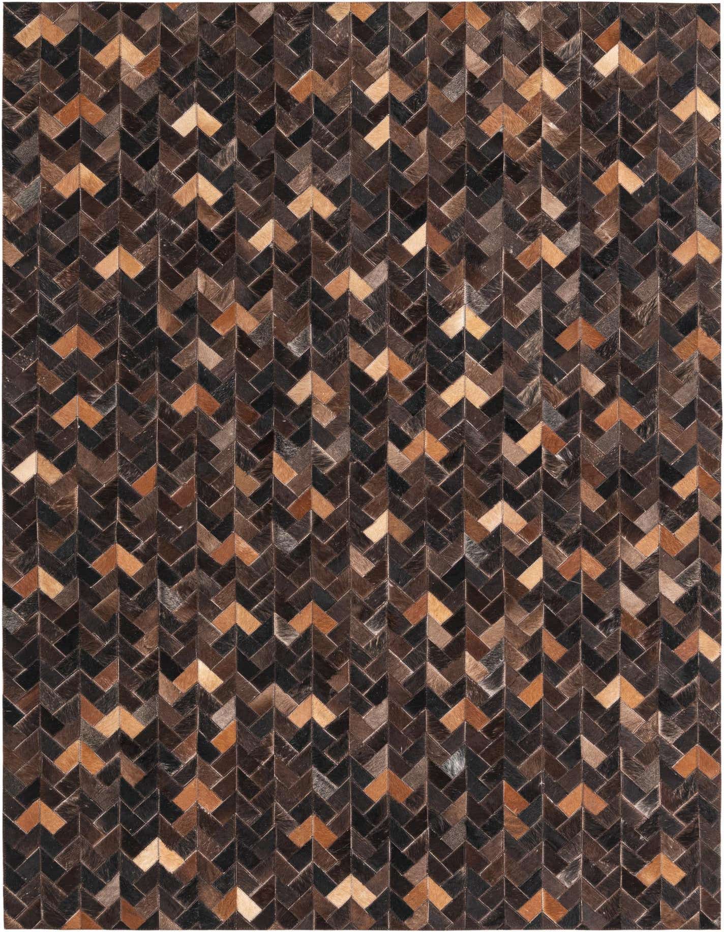 A 5x8 rectangular Cowhide rug featuring a modern chevron pattern in various shades of brown and tan.