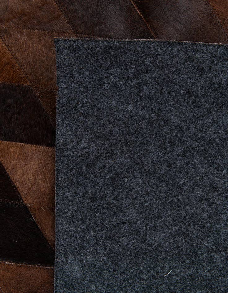 Detail image of  8' 1 x 10' 2 Cowhide Stocks Rug