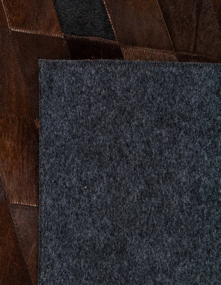 Detail image of  8' 1 x 10' 2 Cowhide Stocks Rug