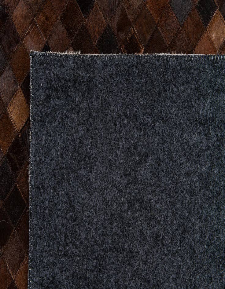 Detail image of  8' 2 x 10' 1 Cowhide Stocks Rug