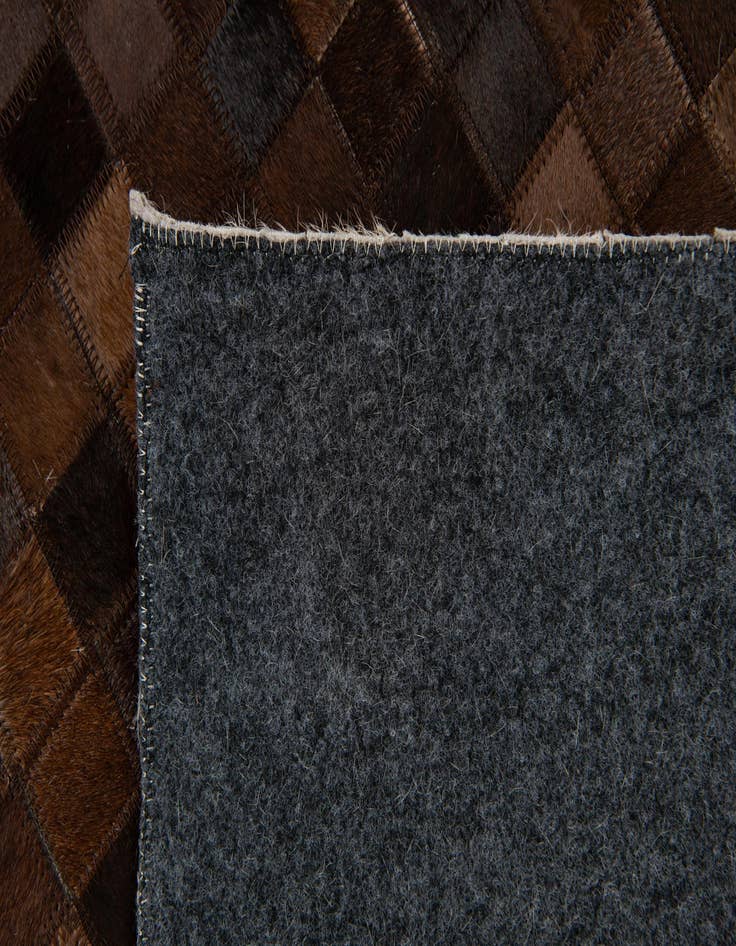 Detail image of  8' x 9' 10 Cowhide Stocks Rug