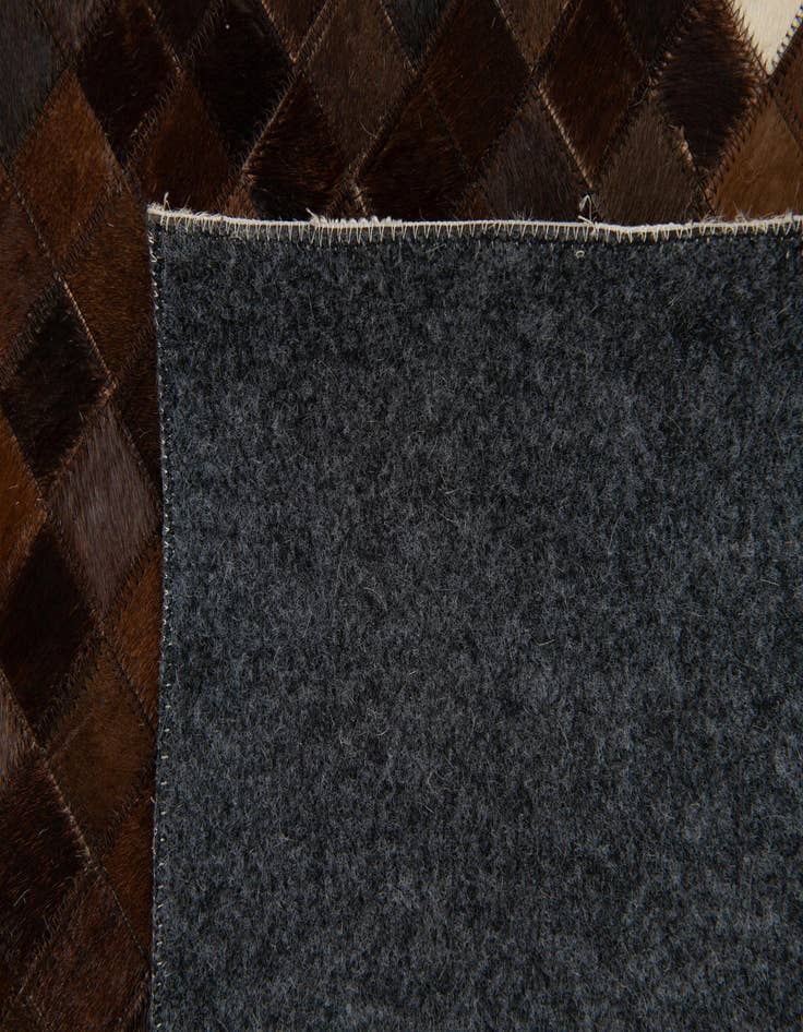 Detail image of  8' 2 x 9' 11 Cowhide Stocks Rug