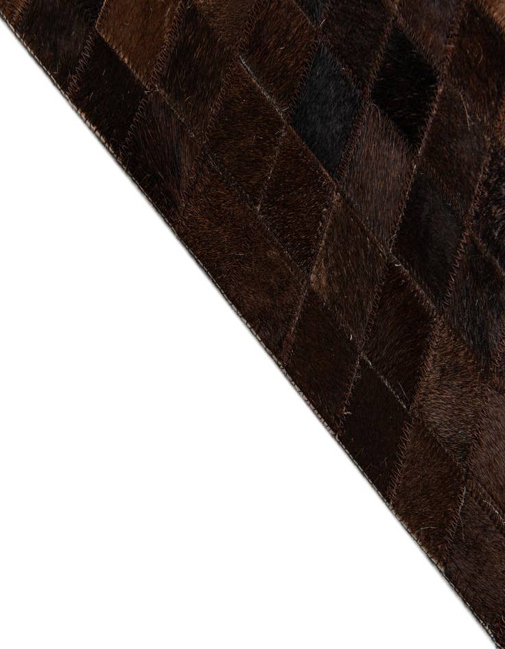 Detail image of  5' 11 x 9' Cowhide Stocks Rug
