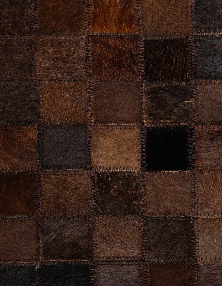 Detail image of  5' 11 x 9' Cowhide Stocks Rug