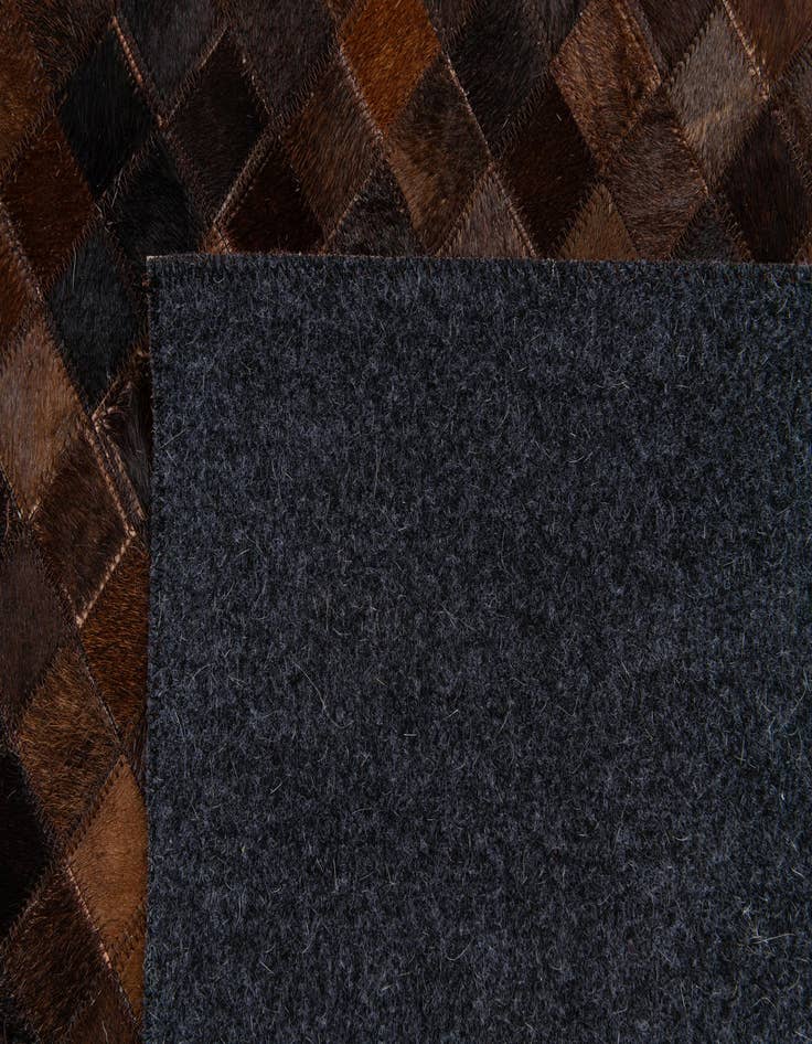 Detail image of  5' 11 x 9' Cowhide Stocks Rug