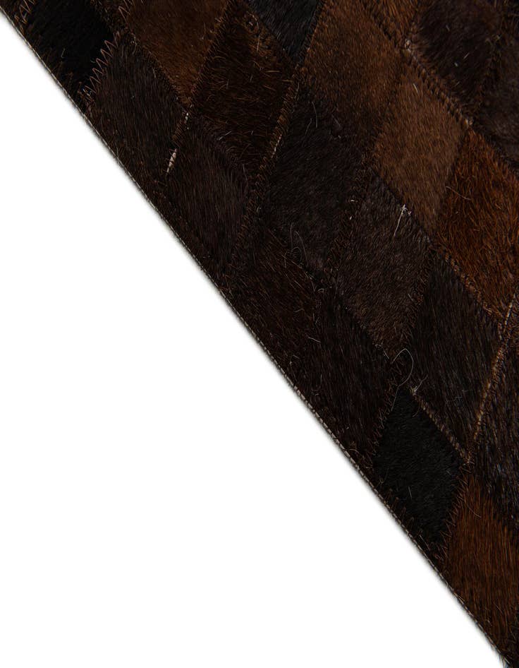 Detail image of  5' 11 x 8' 11 Cowhide Stocks Rug