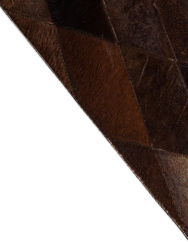Detail image of  6' 6 x 9' 9 Cowhide Stocks Rug