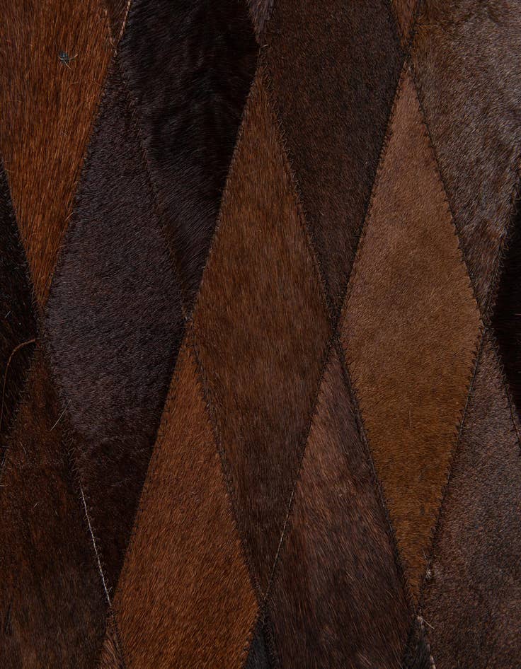 Detail image of  6' 6 x 9' 9 Cowhide Stocks Rug