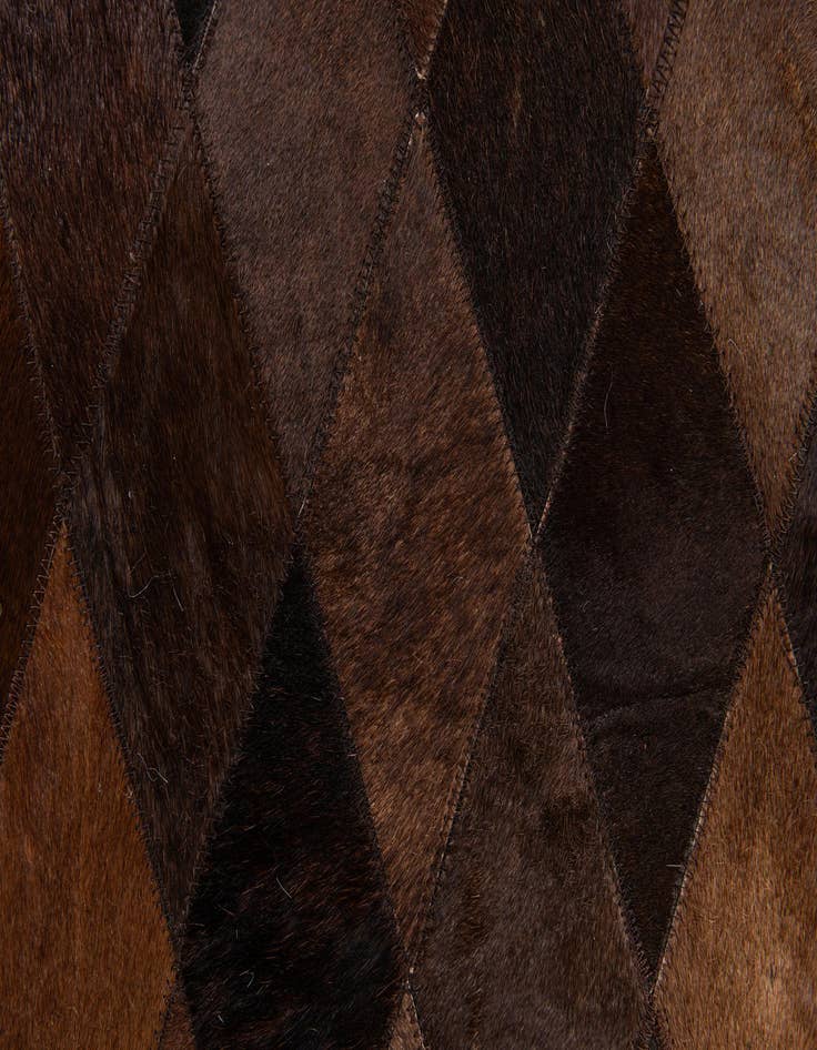 Detail image of  6' 6 x 9' 10 Cowhide Stocks Rug