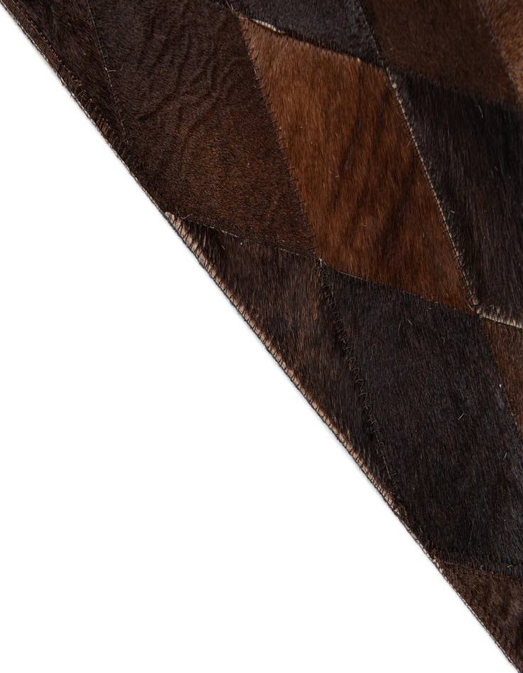 Detail image of  6' 7 x 9' 10 Cowhide Stocks Rug