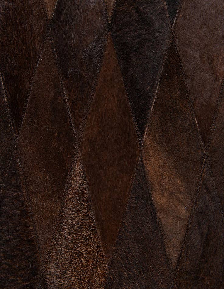 Detail image of  6' 7 x 9' 10 Cowhide Stocks Rug