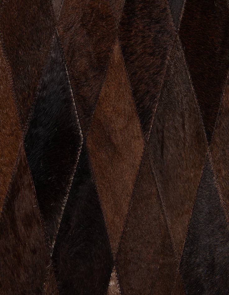 Detail image of  6' 7 x 9' 10 Cowhide Stocks Rug