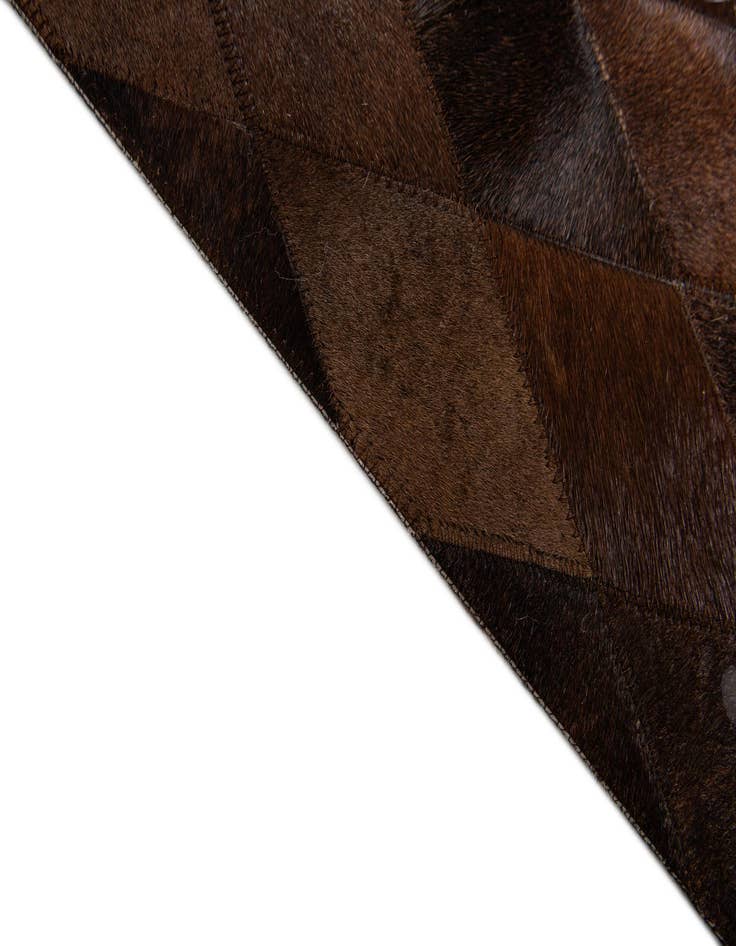 Detail image of  6' 7 x 9' 10 Cowhide Stocks Rug