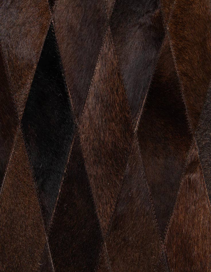 Detail image of  6' 6 x 9' 10 Cowhide Stocks Rug
