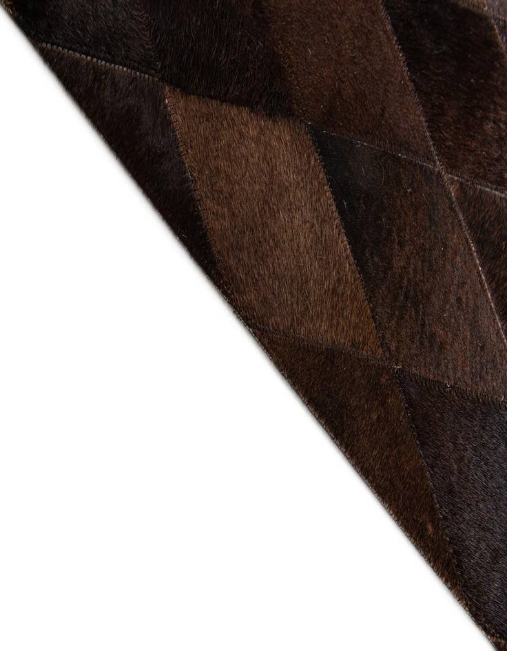 Detail image of  6' 6 x 9' 10 Cowhide Stocks Rug