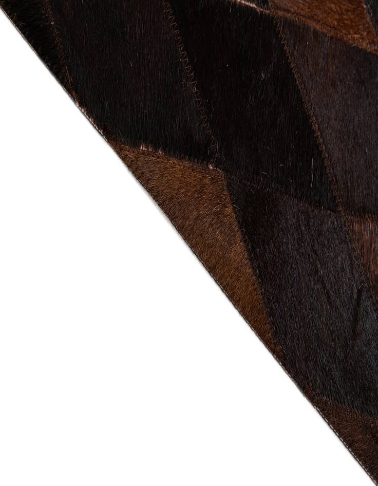 Detail image of  6' 6 x 9' 11 Cowhide Stocks Rug