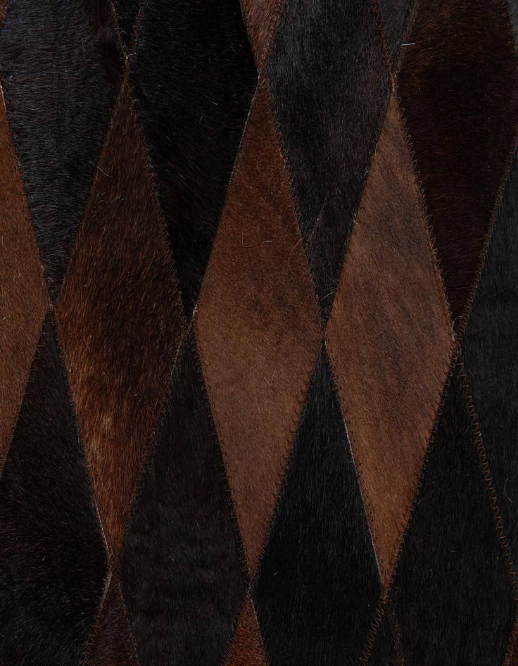 Detail image of  6' 6 x 9' 11 Cowhide Stocks Rug