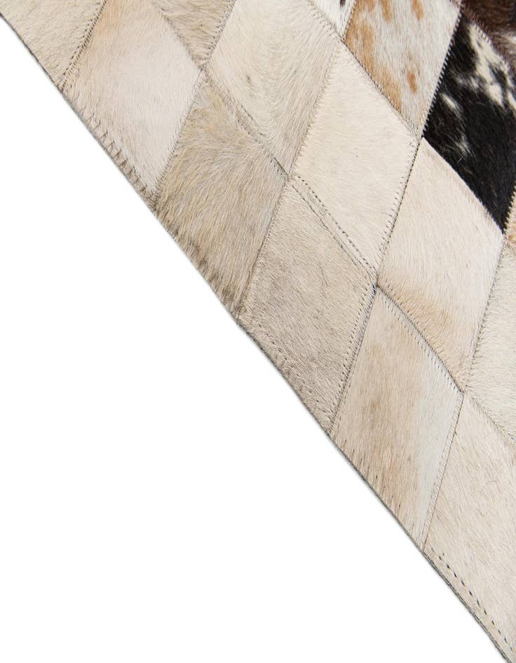 Detail image of  5' x 7' 11 Cowhide Stocks Rug