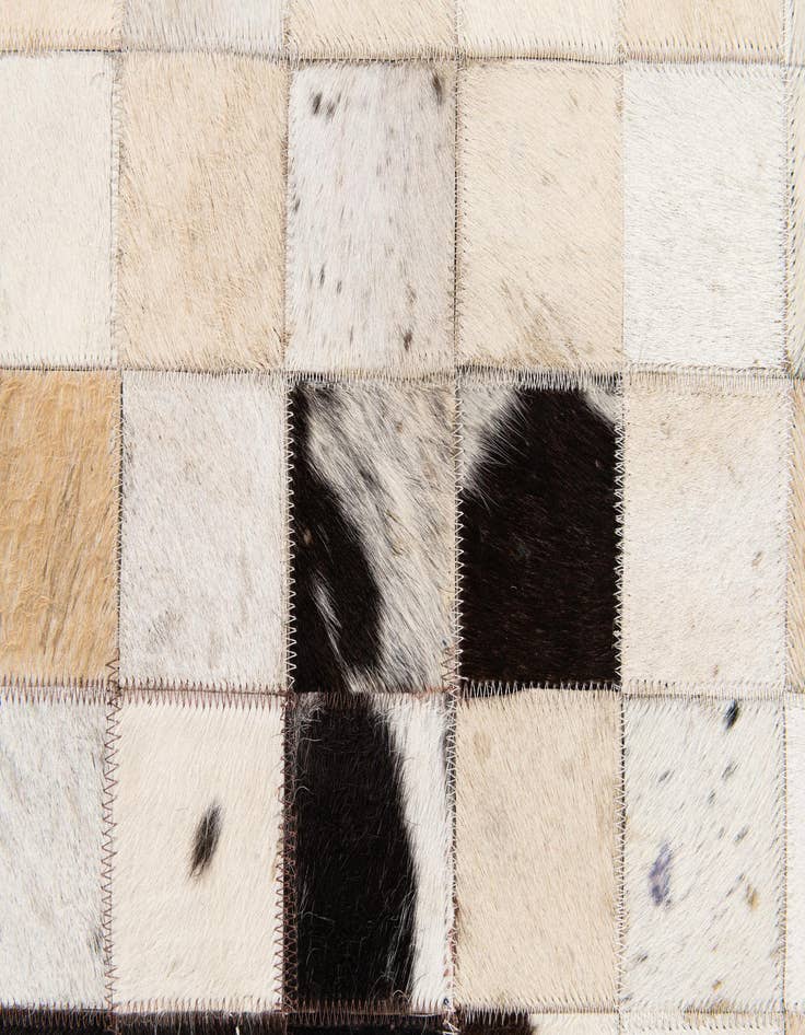 Detail image of  4' 11 x 7' 10 Cowhide Stocks Rug