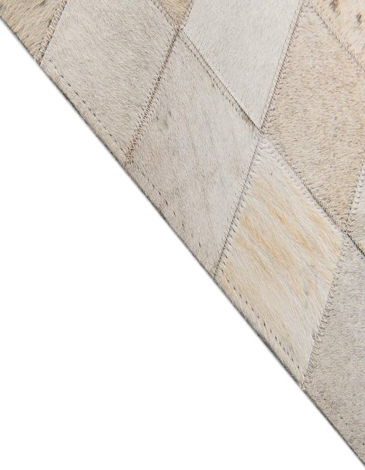 Detail image of  4' 11 x 7' 10 Cowhide Stocks Rug
