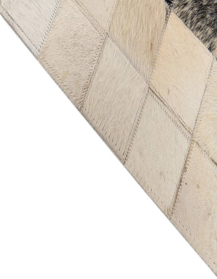 Detail image of  4' 11 x 7' 10 Cowhide Stocks Rug