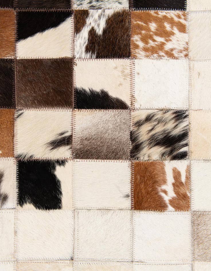 Detail image of  4' 11 x 7' 10 Cowhide Stocks Rug