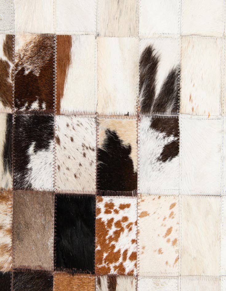 Detail image of  5' 2 x 8' Cowhide Stocks Rug