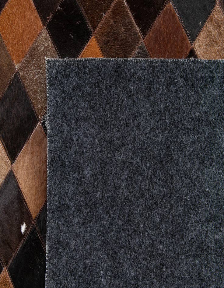 Detail image of  5' 2 x 8' Cowhide Stocks Rug