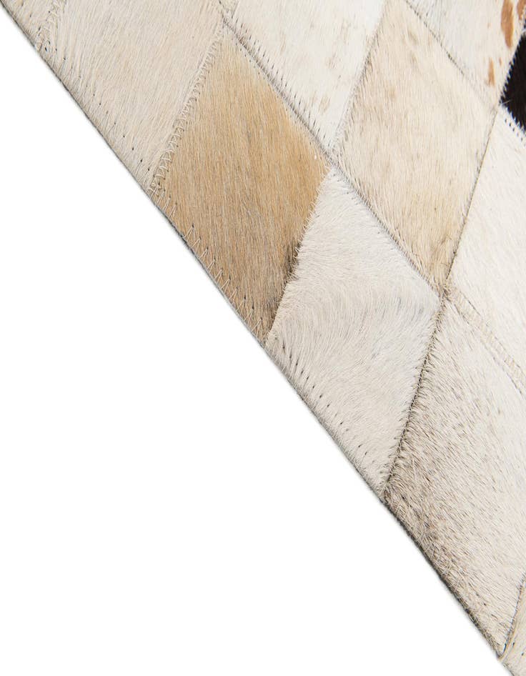 Detail image of  5' x 7' 11 Cowhide Stocks Rug