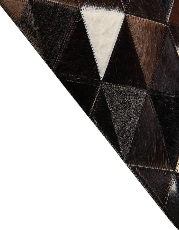 Detail image of  5' x 7' 9 Cowhide Stocks Rug