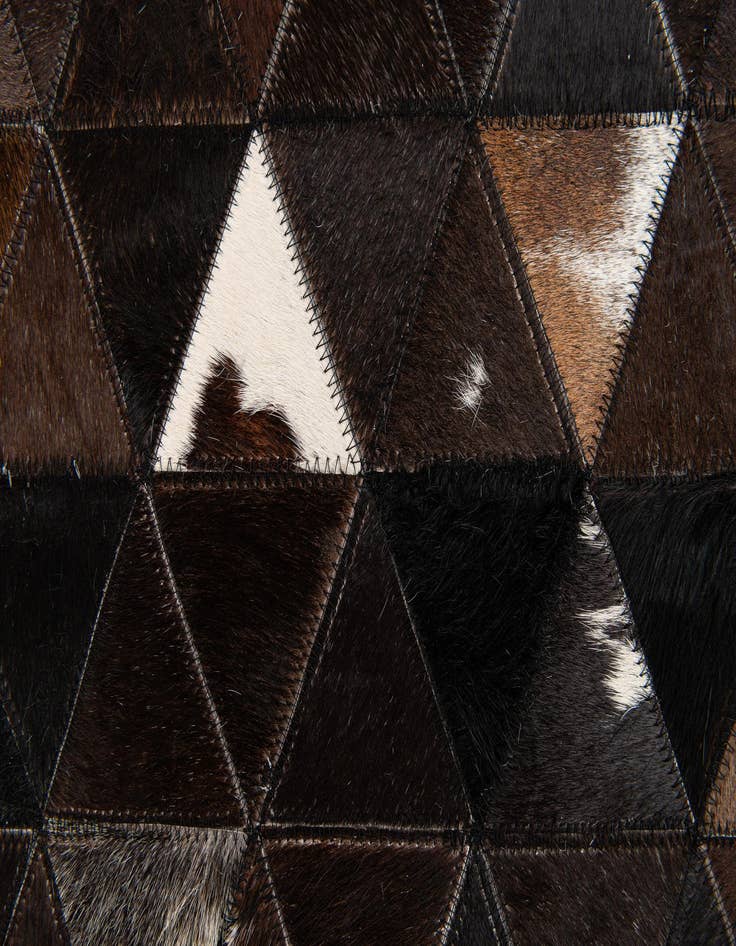 Detail image of  5' x 7' 9 Cowhide Stocks Rug