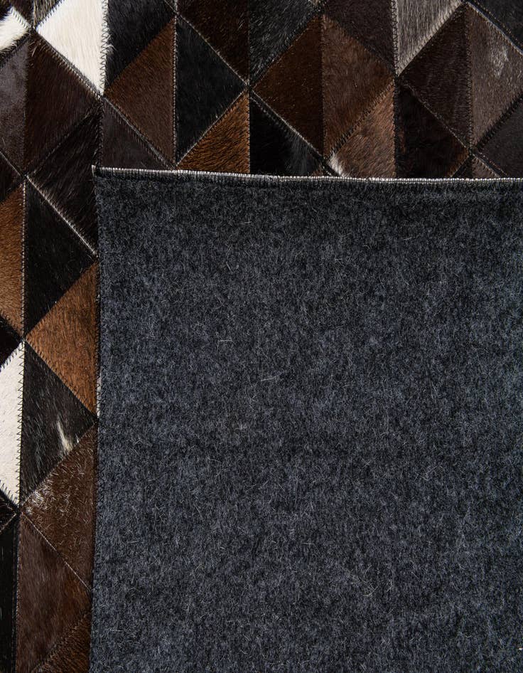 Detail image of  5' x 7' 9 Cowhide Stocks Rug
