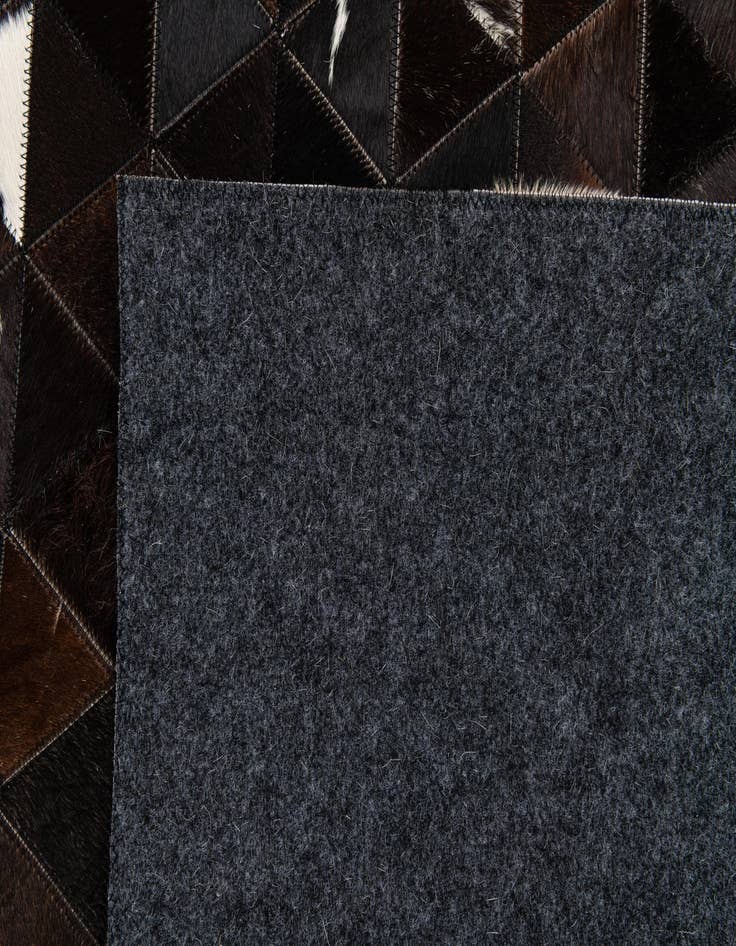 Detail image of  5' 1 x 7' 11 Cowhide Stocks Rug