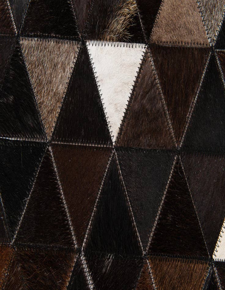 Detail image of  5' x 7' 11 Cowhide Stocks Rug