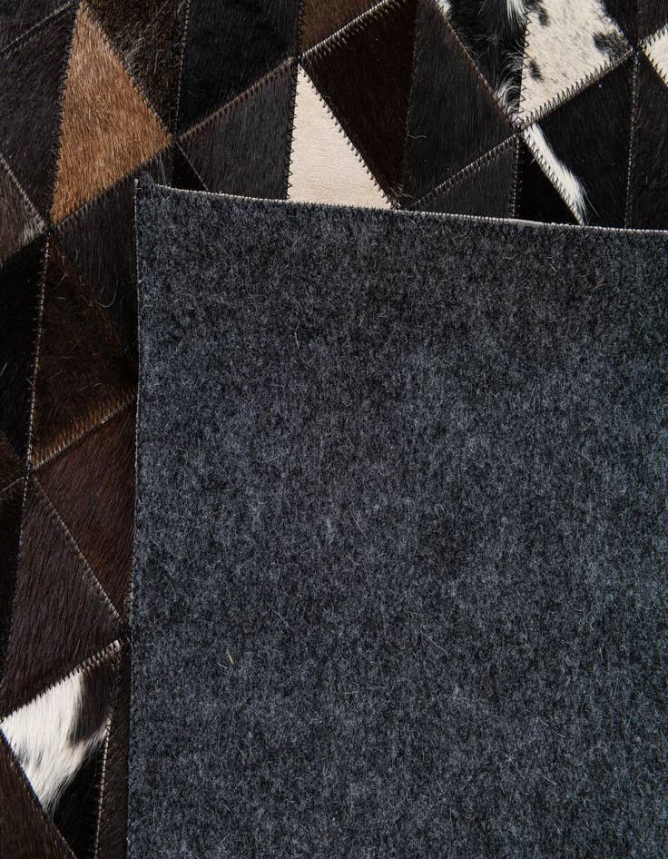 Detail image of  5' x 7' 11 Cowhide Stocks Rug