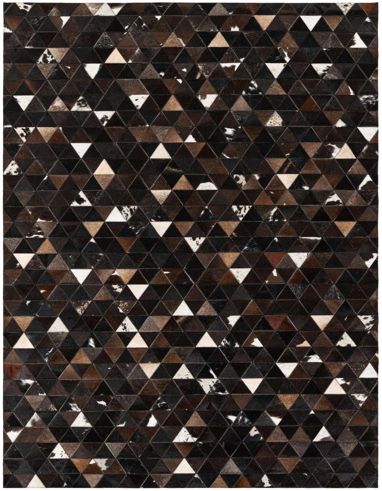 A 5x8 rectangular Cowhide Stocks rug featuring a modern geometric pattern of stitched brown, tan, black, and white cowhide triangles.