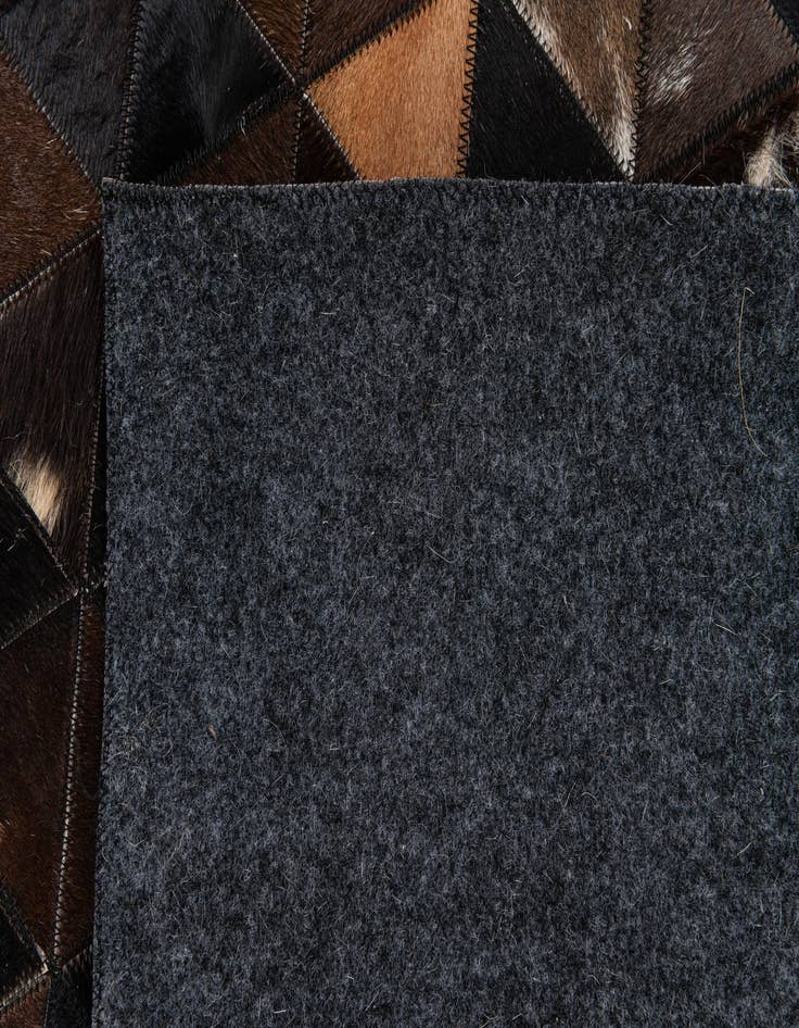 Detail image of  5' x 7' 10 Cowhide Stocks Rug