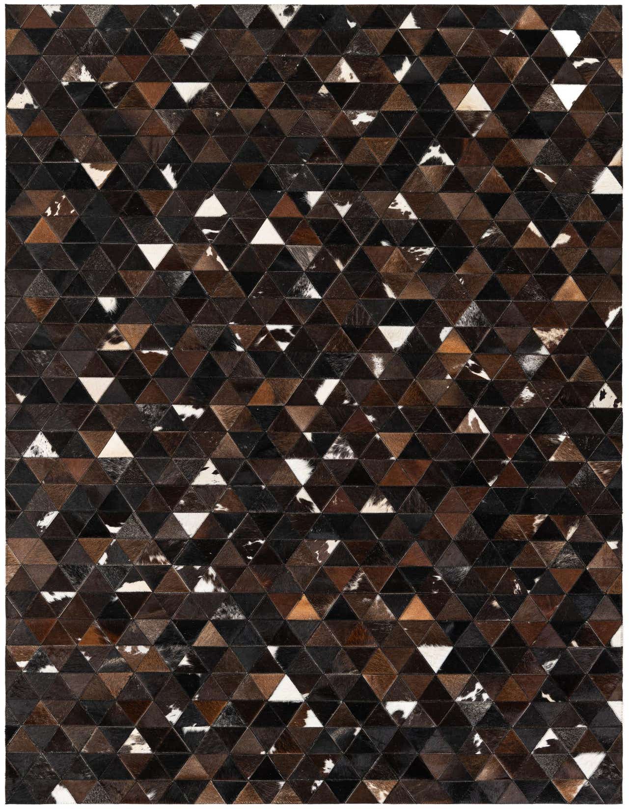 A rectangular 5x8 modern cowhide rug featuring a geometric pattern of brown, black, and white triangular patches.