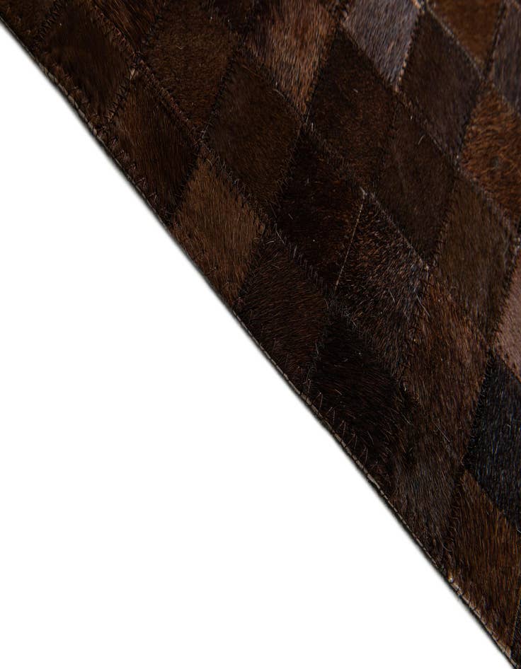 Detail image of  5' 1 x 7' 11 Cowhide Stocks Rug