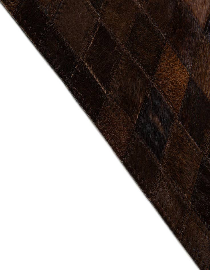 Detail image of  5' x 7' 11 Cowhide Stocks Rug