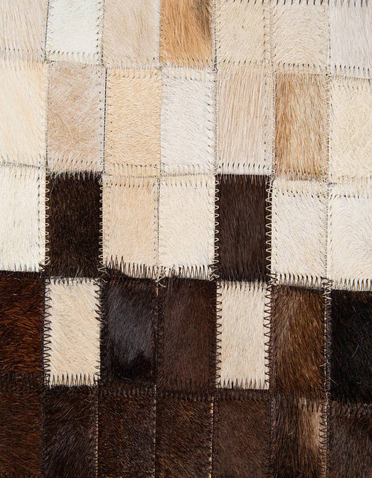 Detail image of  5' x 7' 11 Cowhide Stocks Rug