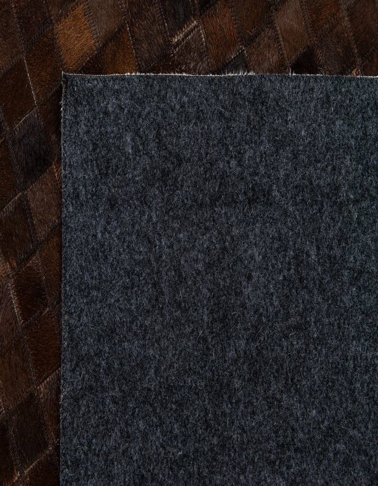 Detail image of  5' x 7' 11 Cowhide Stocks Rug