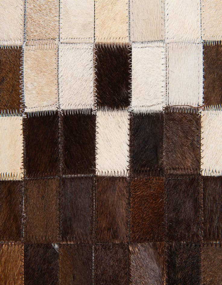 Detail image of  4' 11 x 8' 1 Cowhide Stocks Rug