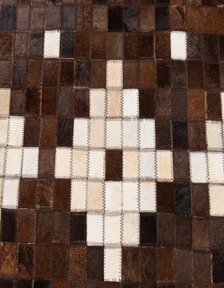 Detail image of  5' 2 x 8' Cowhide Stocks Rug