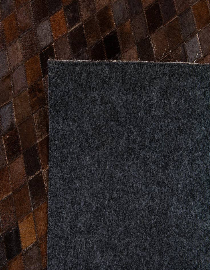 Detail image of  5' 1 x 7' 11 Cowhide Stocks Rug