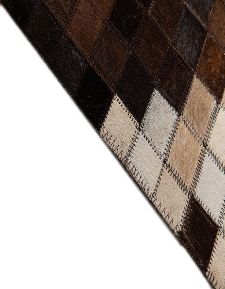 Detail image of  5' 2 x 8' Cowhide Stocks Rug