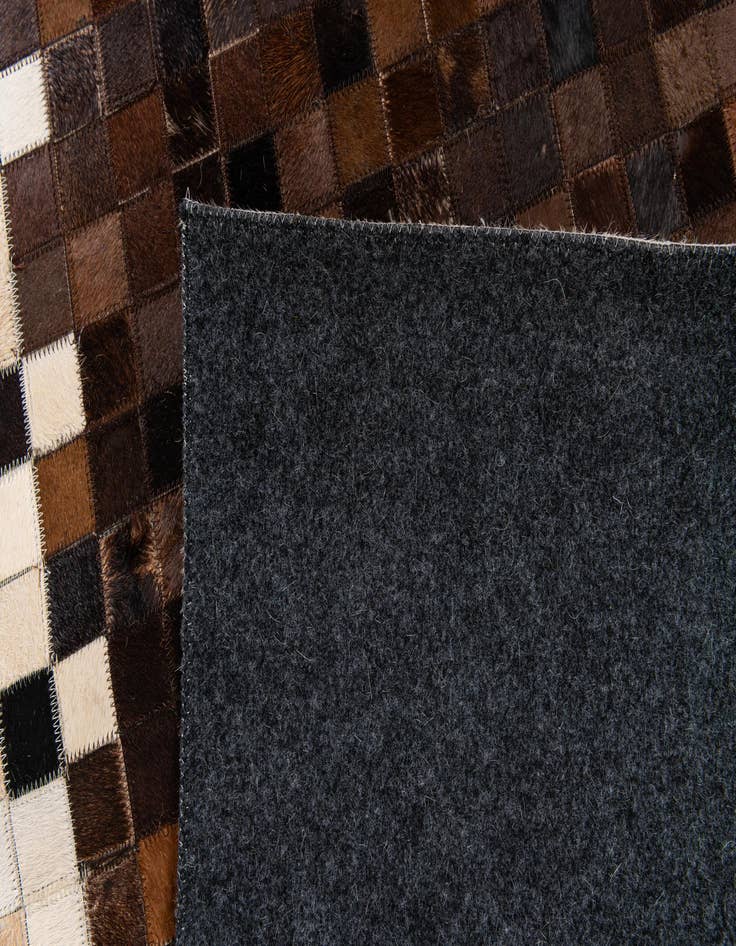 Detail image of  5' 1 x 7' 10 Cowhide Stocks Rug