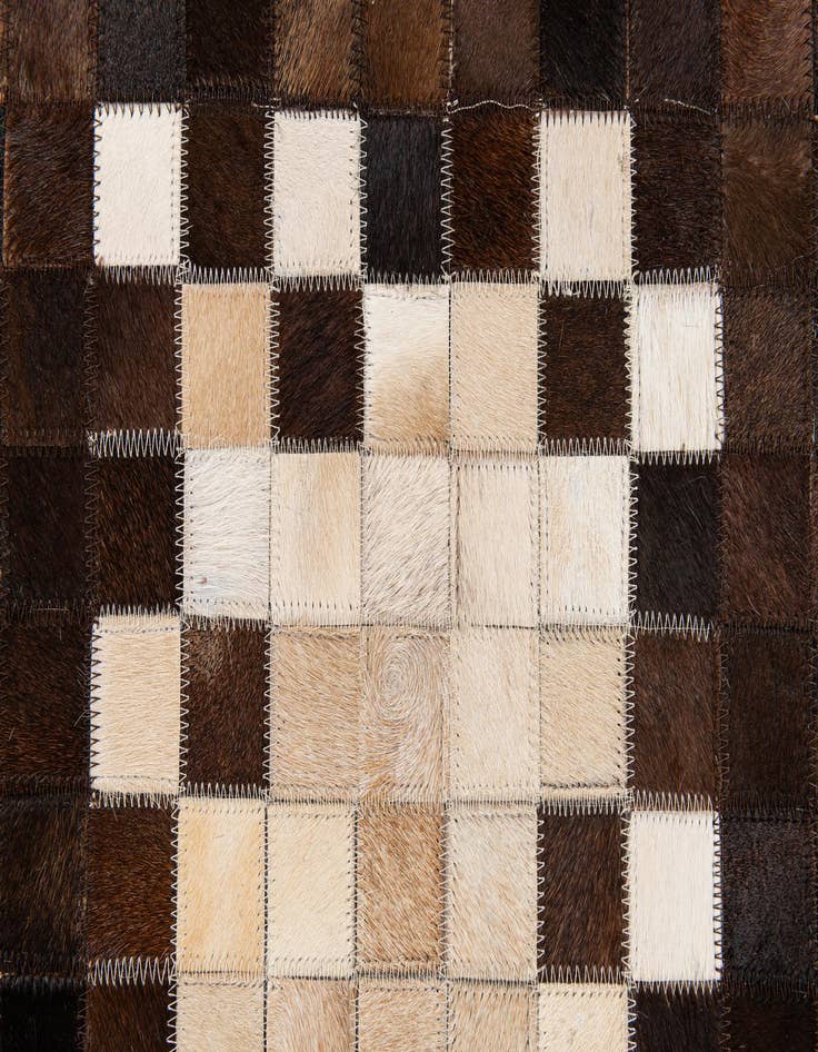 Detail image of  5' 2 x 8' 1 Cowhide Stocks Rug